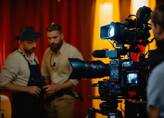 Fedora, Videographer, Curtain, Hat, Television Crew, Camera Accessory